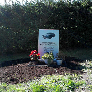 picture of installed peaceyard gravestone, model ada in glacier white color with standard base