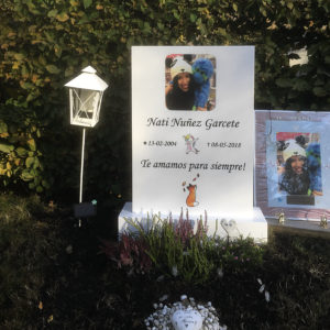 picture of installed peaceyard gravestone, model ada in glacier white color with standard base