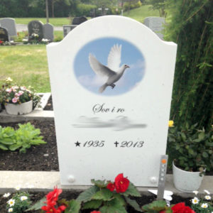 picture of installed peaceyard gravestone, model cora in glacier white color