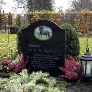 picture of installed peaceyard gravestone, model cora in deep night sky color