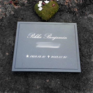 picture of installed peaceyard horizontal gravestone, model ida in deep night sky color