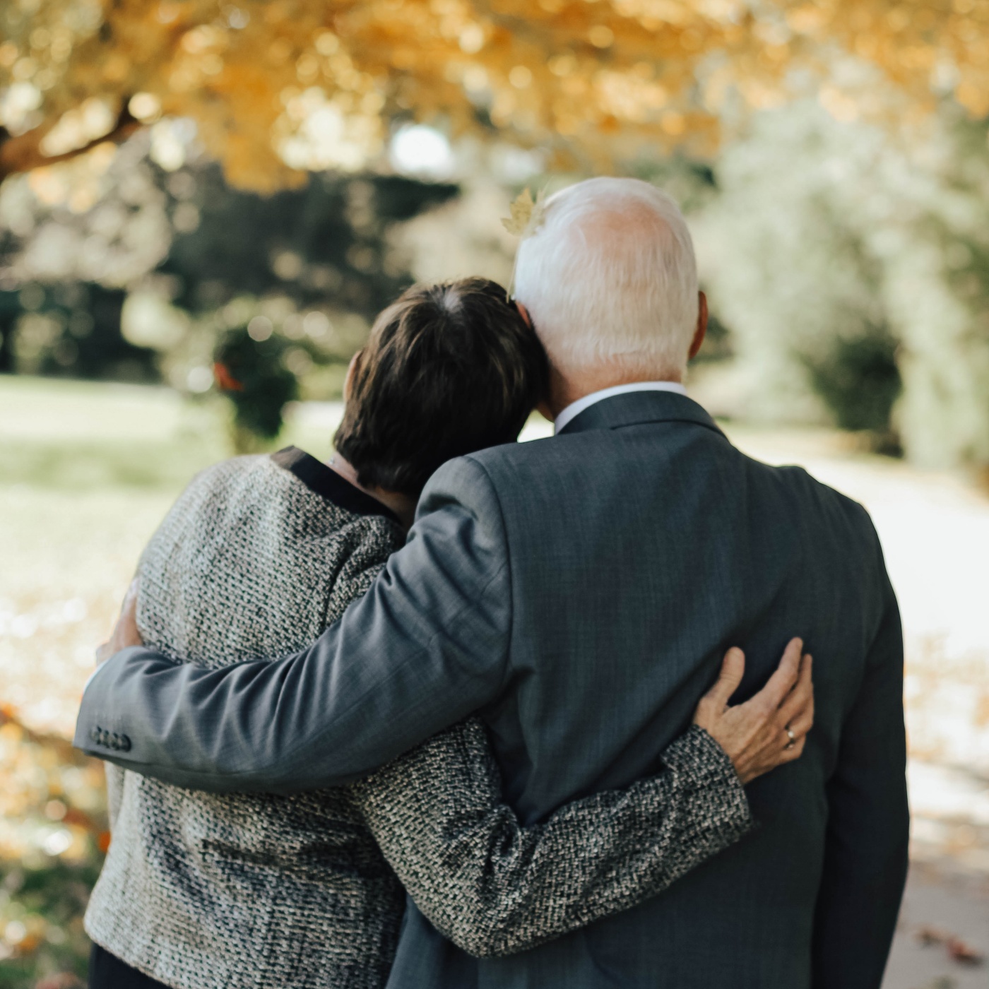 Grieving elderly couple