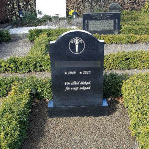 picture of installed peaceyard upright gravestone, model cora in night sky material with customer graphics