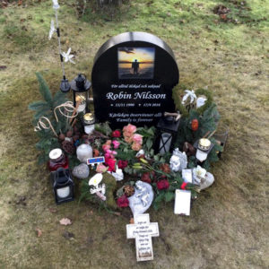 picture of installed peaceyard upright gravestone, model eliza in night sky material with customer graphics