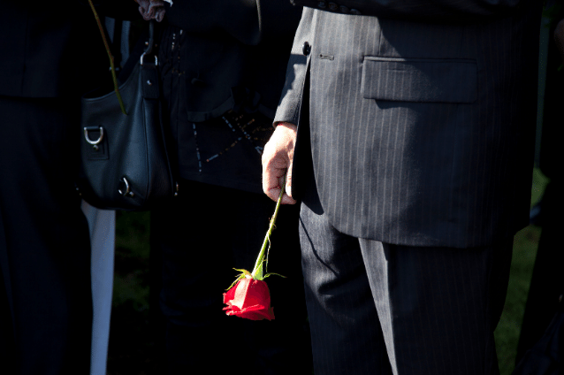 Dark attire at a funeral