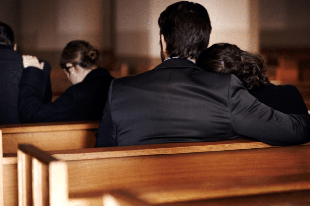 A funeral with a funeral program