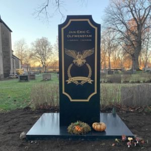 picture of installed peaceyard upright gravestone, custom model in Night Sky material with customer graphics