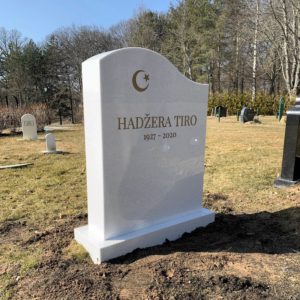 picture of installed peaceyard upright gravestone, Maisie in Everest material with customer graphics, polished